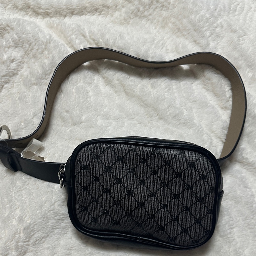 Steve Madden Black and Gray Patterned belth with a bag
